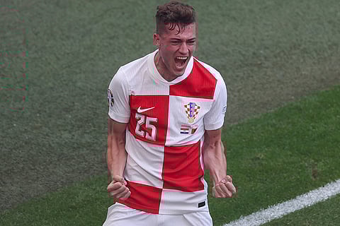 Croatia's Luka Sucic celebrates after scoring a goal